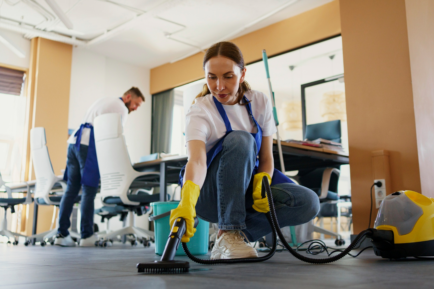 A woman vacuums a room, representing move out cleaning services in Orlando, FL.